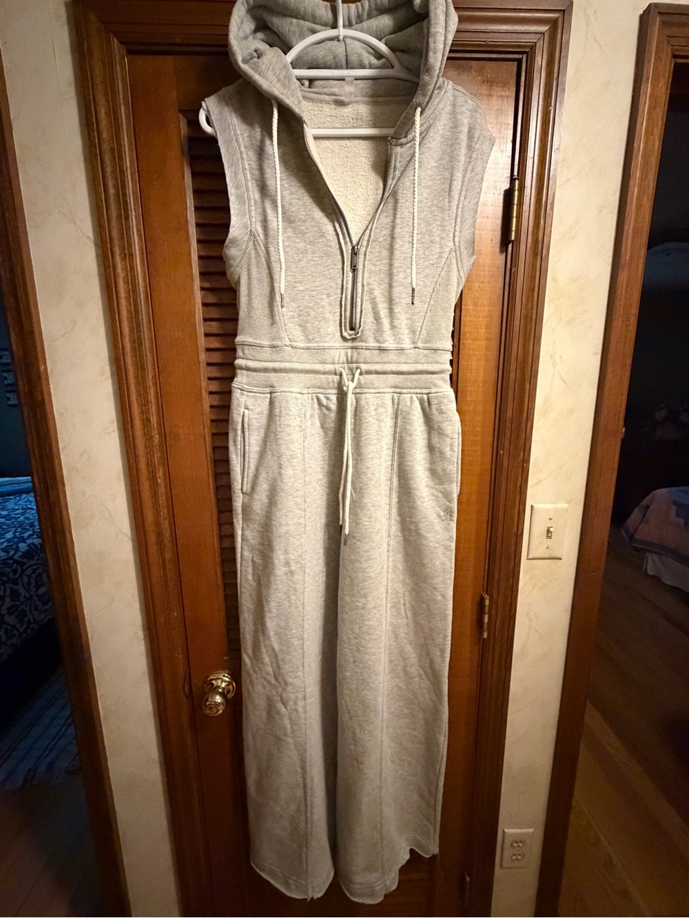 FP Movement by Free People Sleeveless Hooded Drawstring Jumpsuit in Light Gray